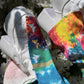 Voyage Passion Y2K tie-dye jeans with butterflies and high side slits