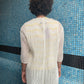 White knit transparent cardigan by Christine Phung