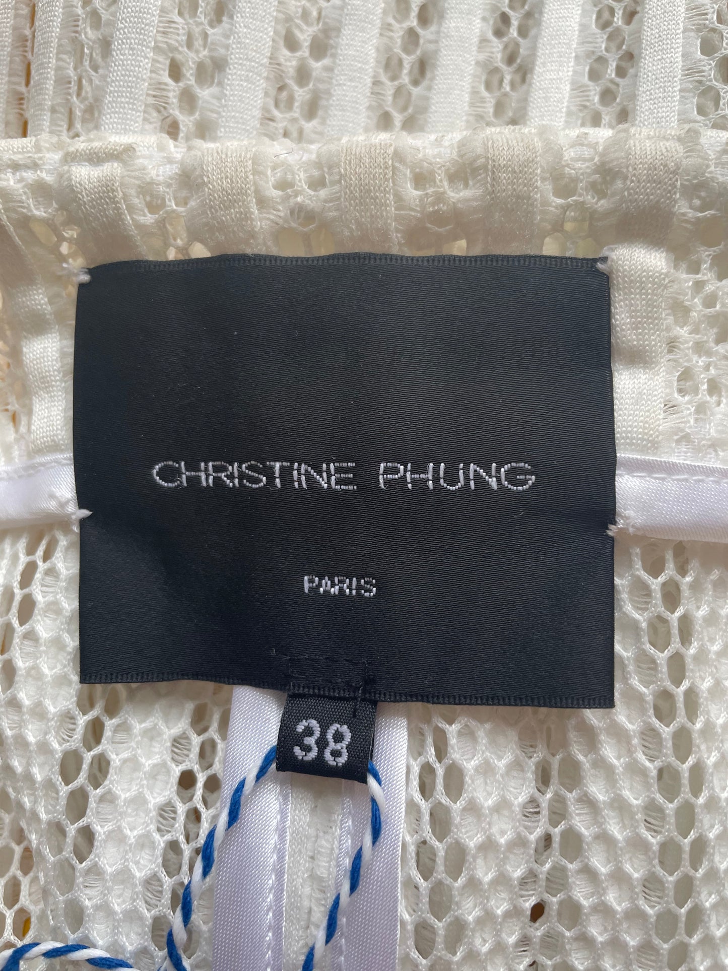 White knit transparent cardigan by Christine Phung