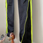 Voyage Passion Y2K black low waisted cotton flared pants with fluorescent yellow zippers on the sides