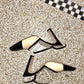 Chanel 90's beige and black pumps with Chanel logo