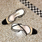 Chanel 90's beige and black pumps with Chanel logo