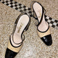 Chanel 90's beige and black pumps with Chanel logo
