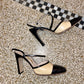Chanel 90's beige and black pumps with Chanel logo
