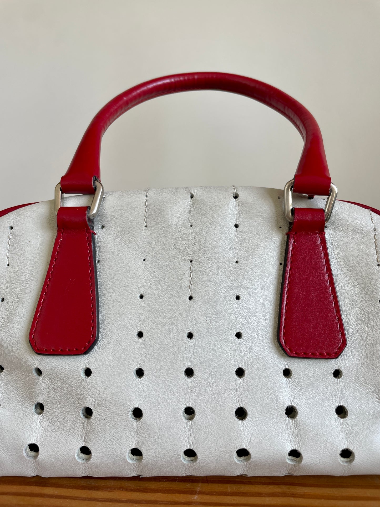 Prada 2000's white and red mini bowling bag with perforated leather
