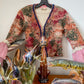 Voyage 2000's wrinkled tie dye top with Marie Antoinette sleeves and beads