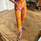 Christian Lacroix 90's op art red and yellow high waisted jeans with B/W face prints