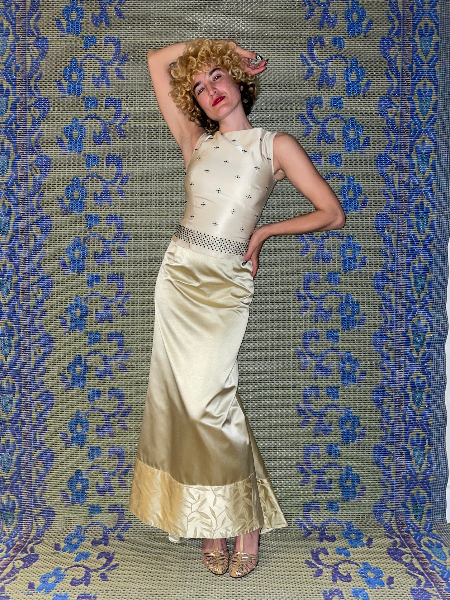 Prada 1997 golden silk maxi skirt with floral embroideries at the bottom