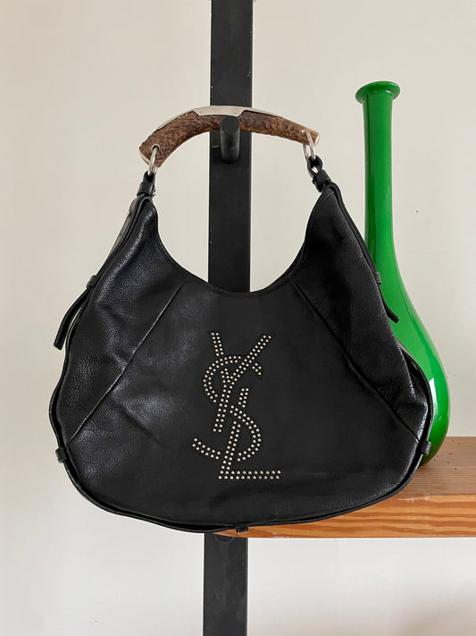 Saint Laurent 2000's iconic Mombasa handbag in black with YSL logo in studs